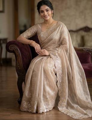 Beige silk blend embroidered saree with thread work 3