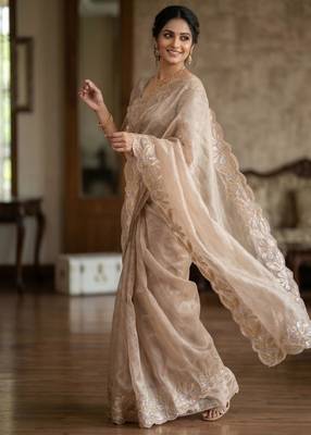 Beige silk blend embroidered saree with thread work 4
