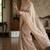 Beige silk blend embroidered saree with thread work