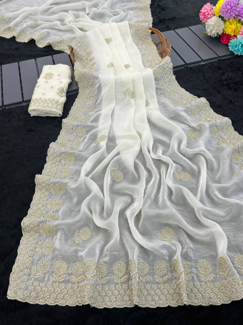 White satin embroidered saree with sequins work