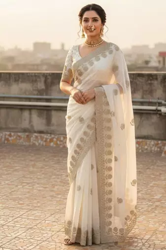 White satin embroidered saree with sequins work