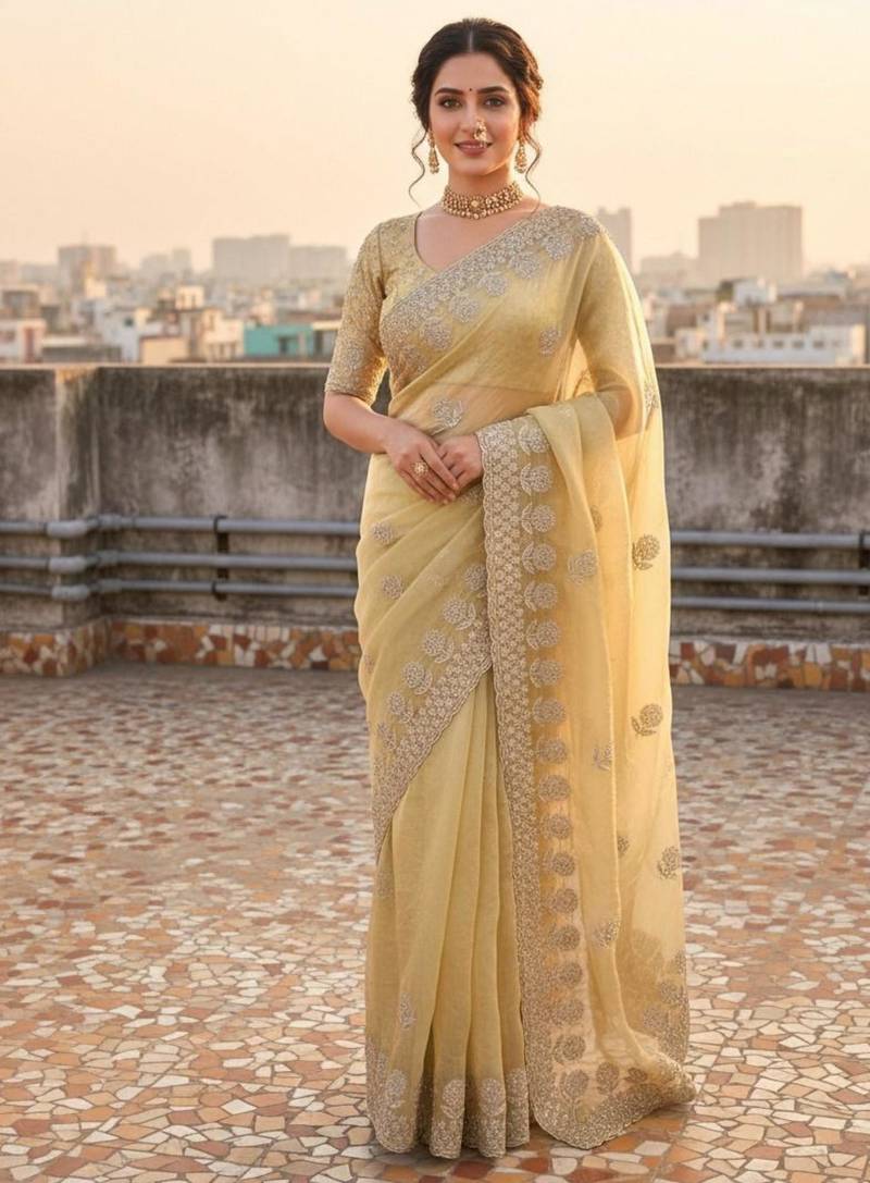Yellow satin embroidered saree with sequins work