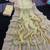 Yellow satin embroidered saree with sequins work