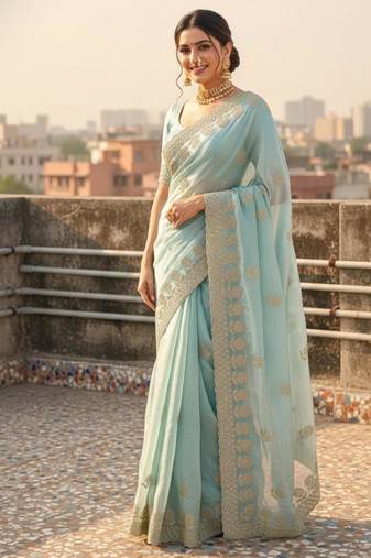 Sky blue satin embroidered saree with sequins work