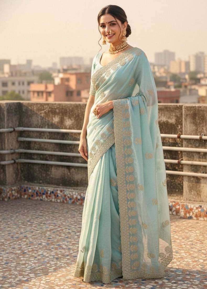 Sky blue satin embroidered saree with sequins work