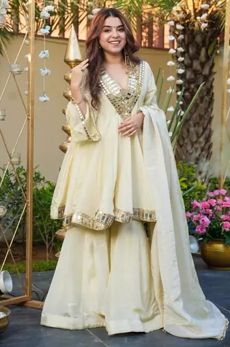 cream chinnon sharara suit set with heavy mirror work