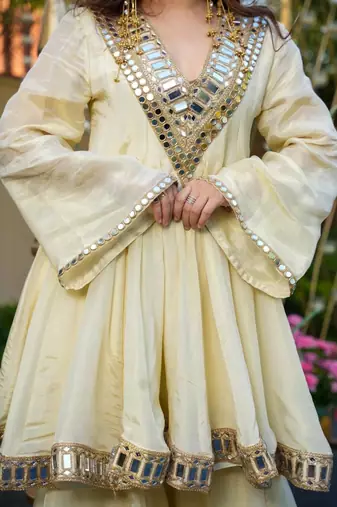 cream chinnon sharara suit set with heavy mirror work