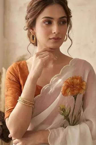 Cream silk blend printed saree with floral print