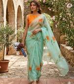 Sea green silk blend printed saree with floral print