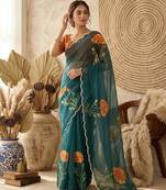Teal silk blend printed saree with floral print
