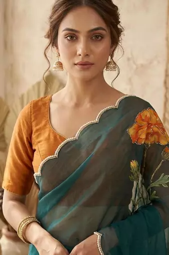 Teal silk blend printed saree with floral print