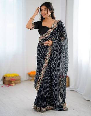 Black georgette printed saree with stripes print 1