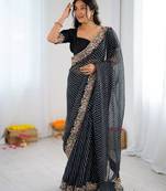 Black georgette printed saree with stripes print