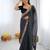 Black georgette printed saree with stripes print