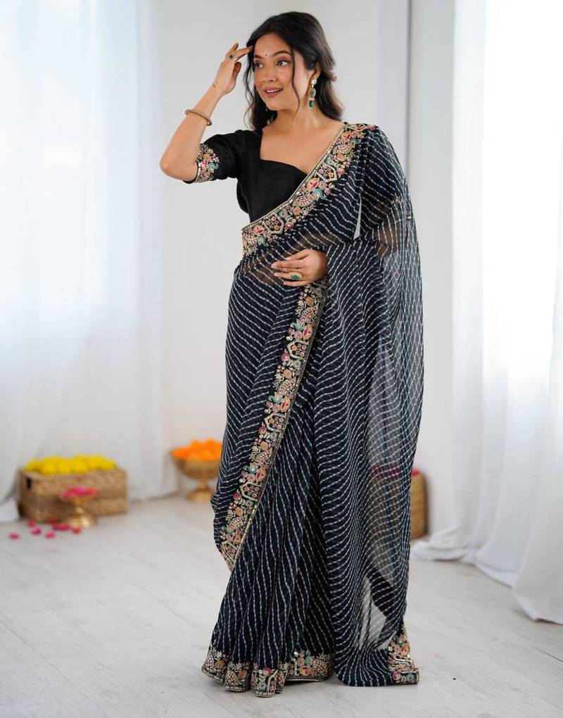 Black georgette printed saree with stripes print