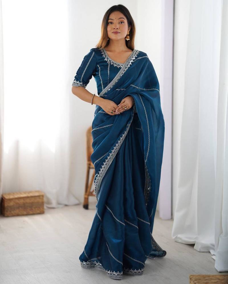 Teal silk blend embroidered saree with sequins work