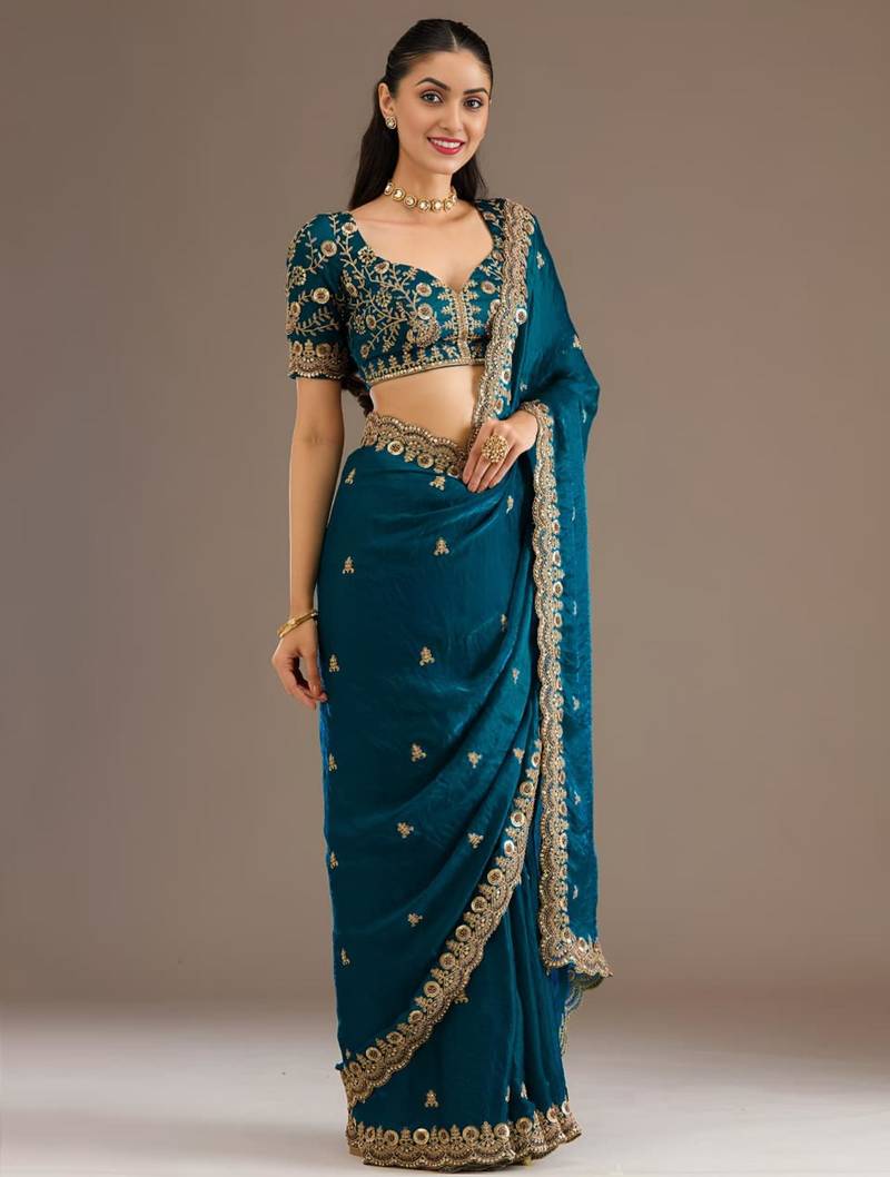 Teal silk blend embroidered saree with sequins work