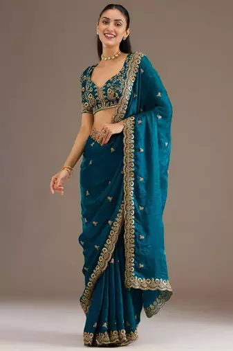 Teal silk blend embroidered saree with sequins work