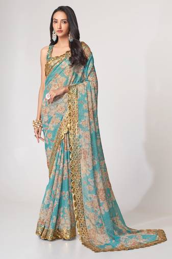 Sky blue organza printed saree with sequins work