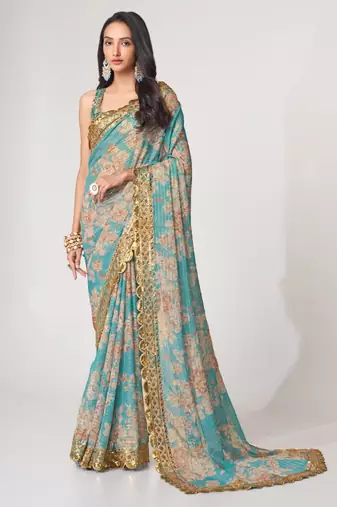 Sky blue organza printed saree with sequins work