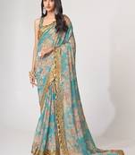 Sky blue organza printed saree with sequins work