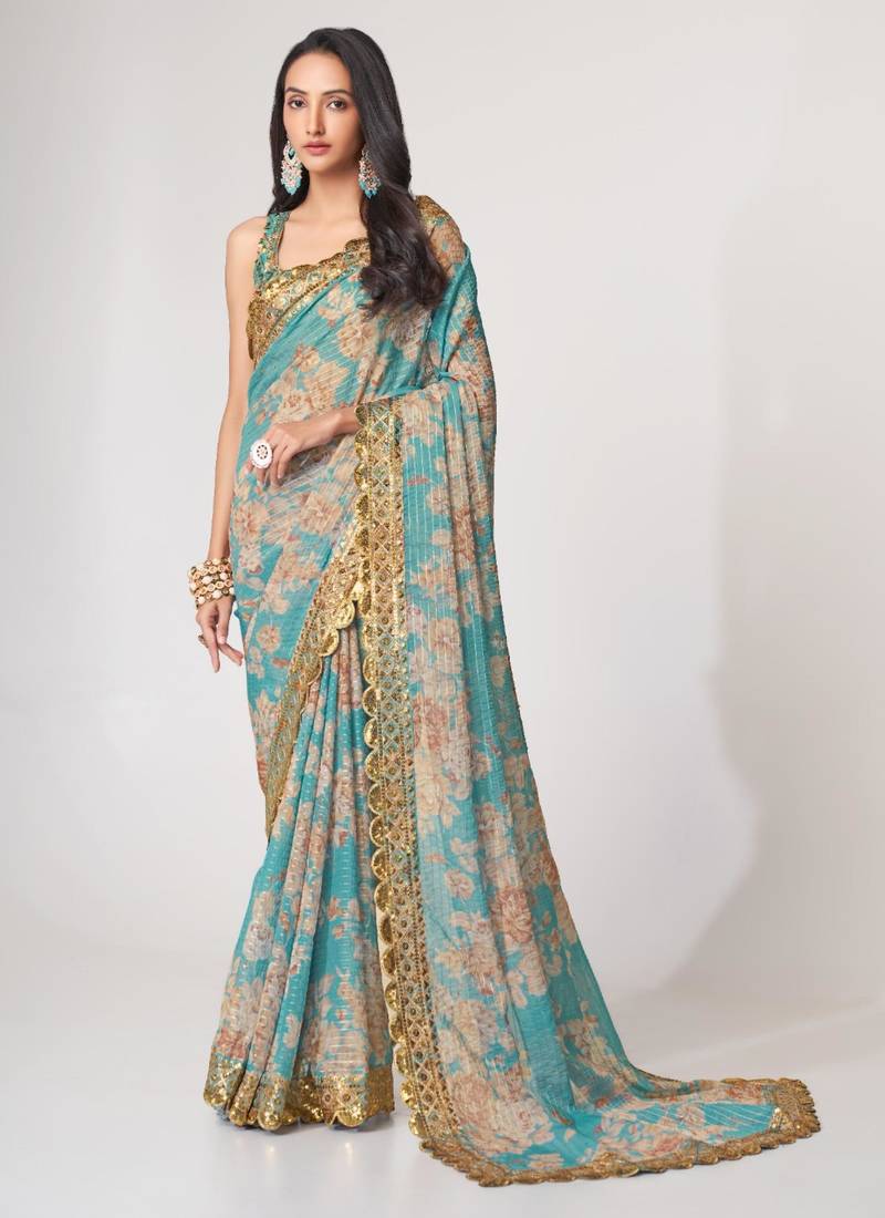 Sky blue organza printed saree with sequins work