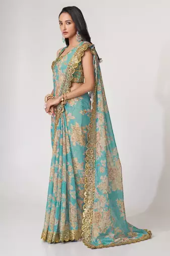 Sky blue organza printed saree with sequins work