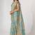 Sky blue organza printed saree with sequins work