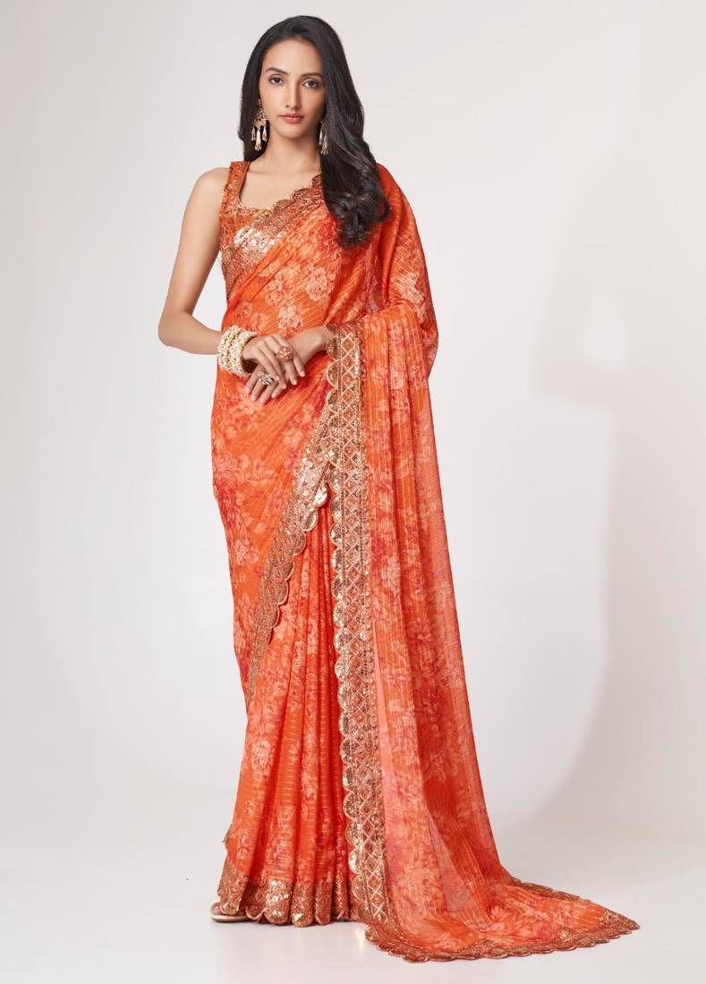 Orange organza printed saree with sequins work