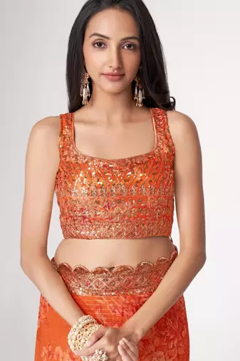 Orange organza printed saree with sequins work