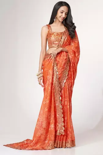Orange organza printed saree with sequins work