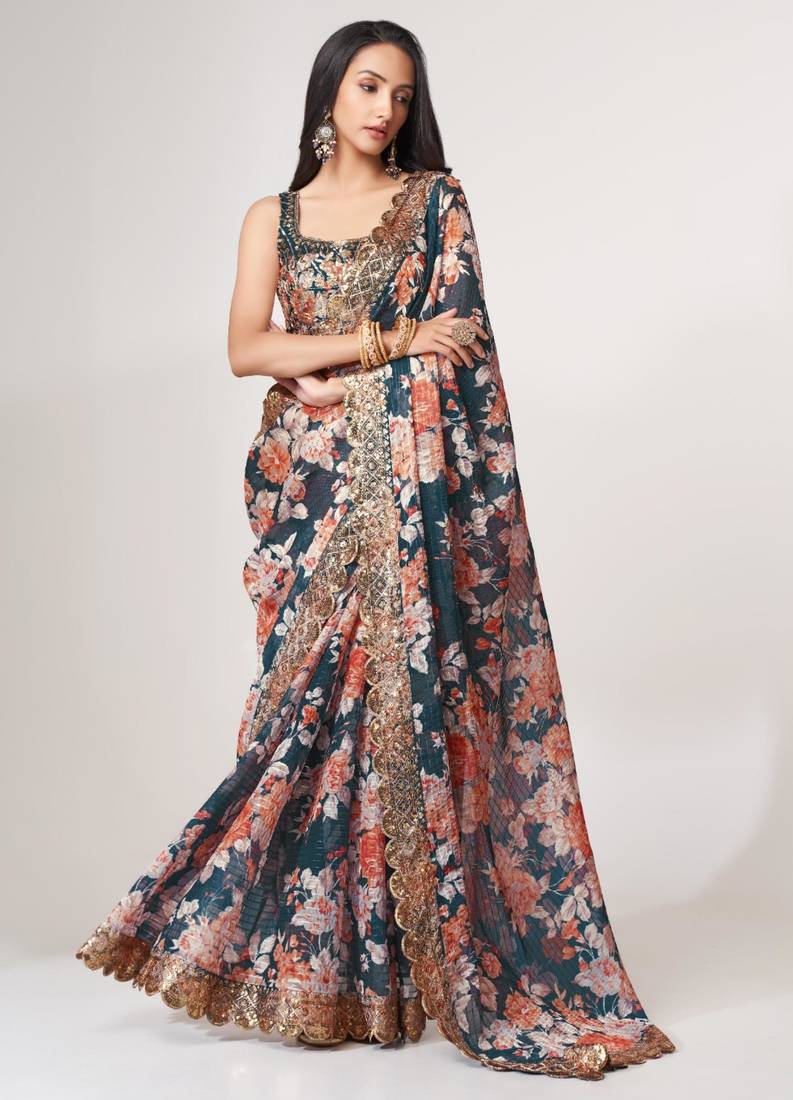 Teal organza printed saree with sequins work