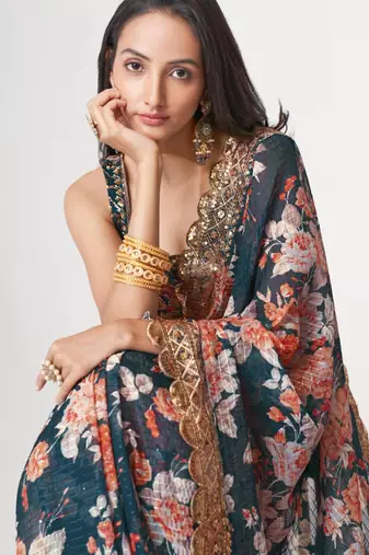 Teal organza printed saree with sequins work