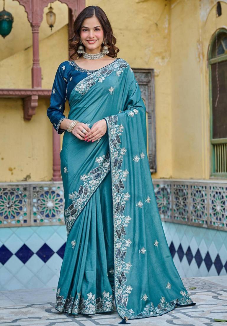 Teal silk blend embroidered saree with thread work