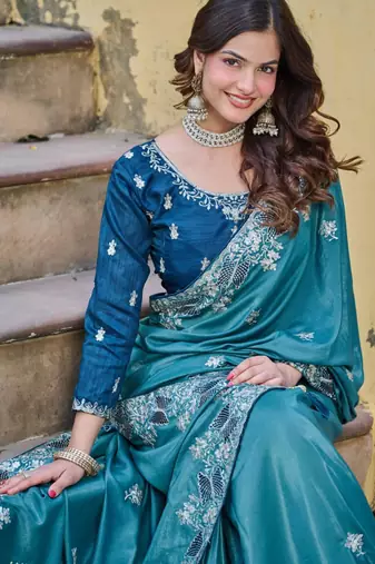 Teal silk blend embroidered saree with thread work