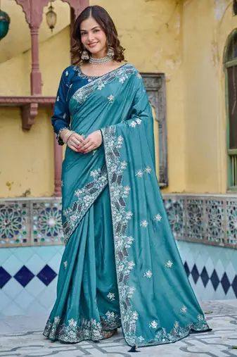 Teal silk blend embroidered saree with thread work