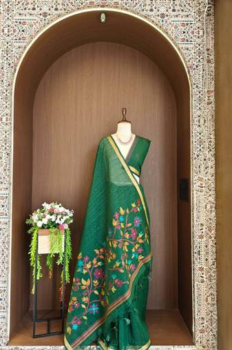 Green silk blend printed saree with zari work