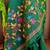 Green silk blend printed saree with zari work
