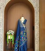 Teal silk blend printed saree with zari work