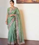 Sea green tissue embroidered saree with thread work