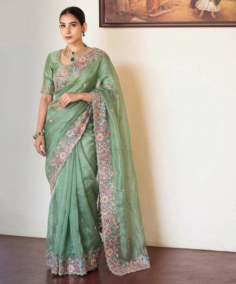 Sea green tissue embroidered saree with thread work