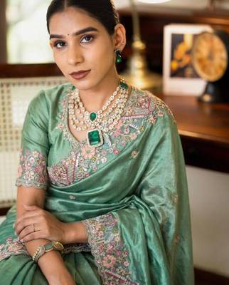 Sea green tissue embroidered saree with thread work 4