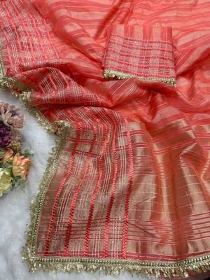 Orange tissue printed saree with stripes print 3