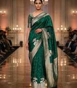 Green silk blend printed saree with zari work