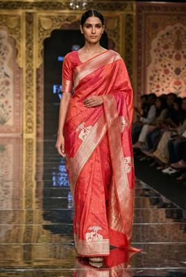 Orange silk blend printed saree with zari work 1