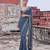 Teal georgette embroidered saree with mirror work