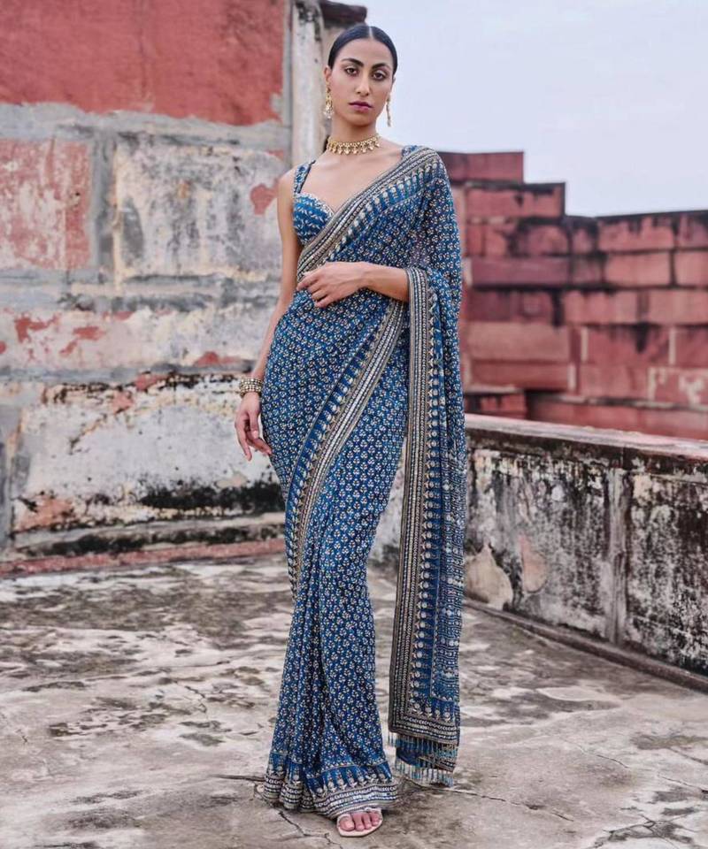 Teal georgette embroidered saree with mirror work