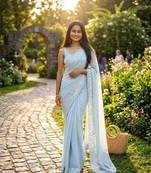 Sky blue georgette embroidered saree with sequins work