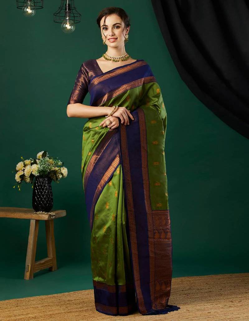 Green silk blend woven saree