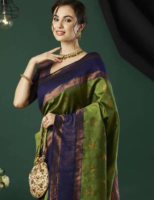 Green silk blend woven saree 4